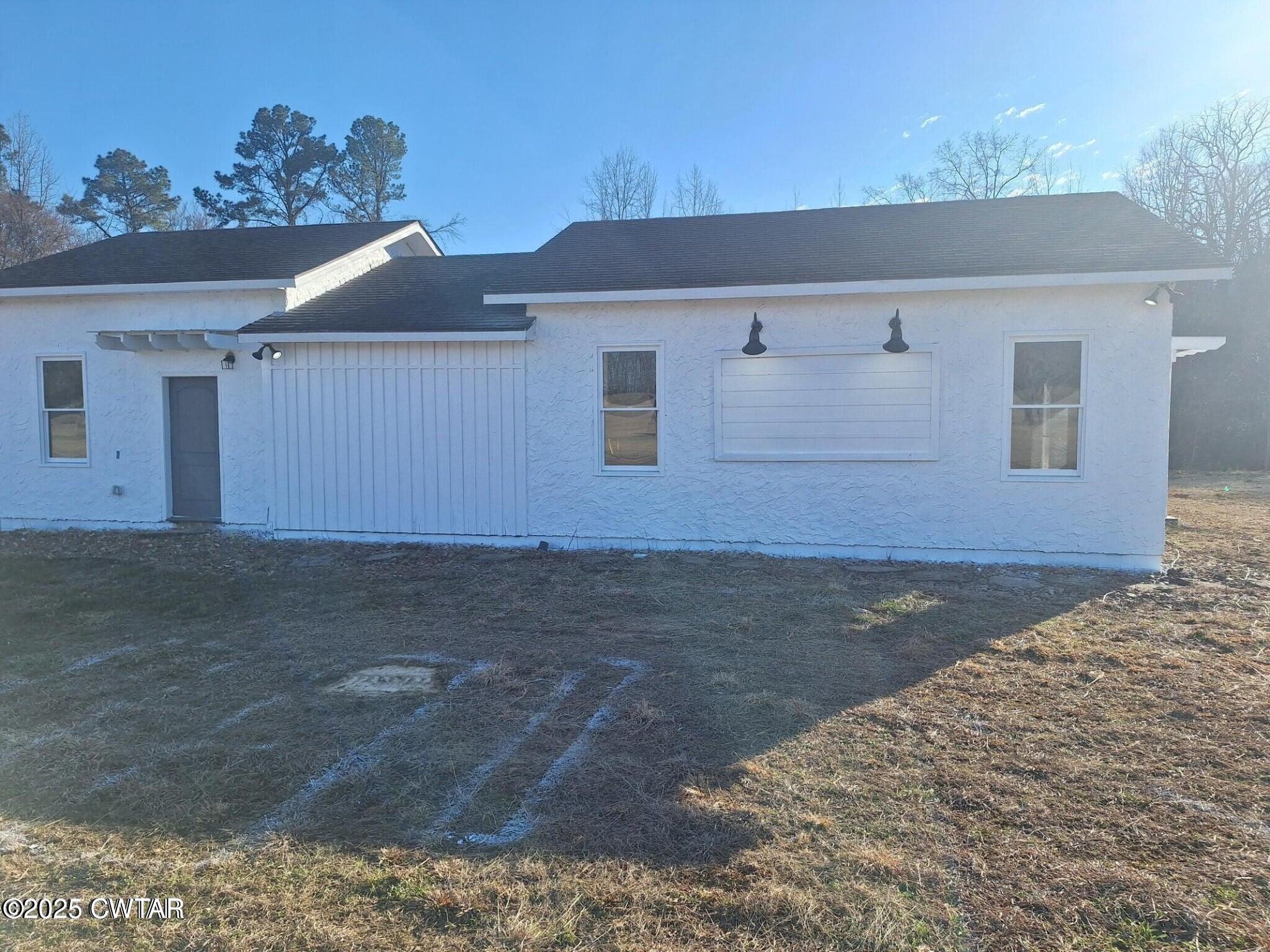 600 Highway 64 Adamsville, TN 38310 - Photo 24 of 25 a front view of a house