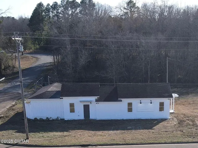 a front view of a house with stairs