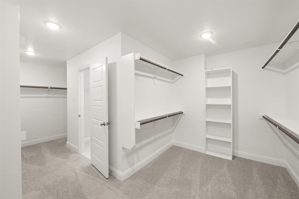 228 Shepards Street Godley, TX 76044 - Photo 12 of 27 a view of an empty walk in closet