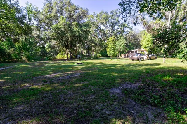 a view of a street with a trees