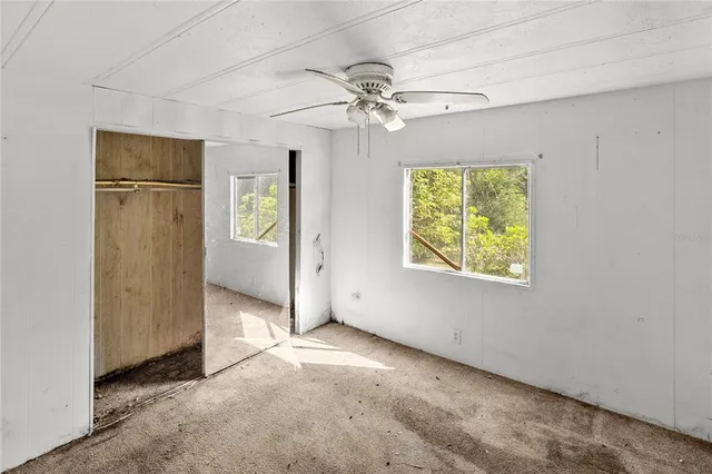 a view of a hallway with front door