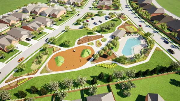 a garden with trees in the background