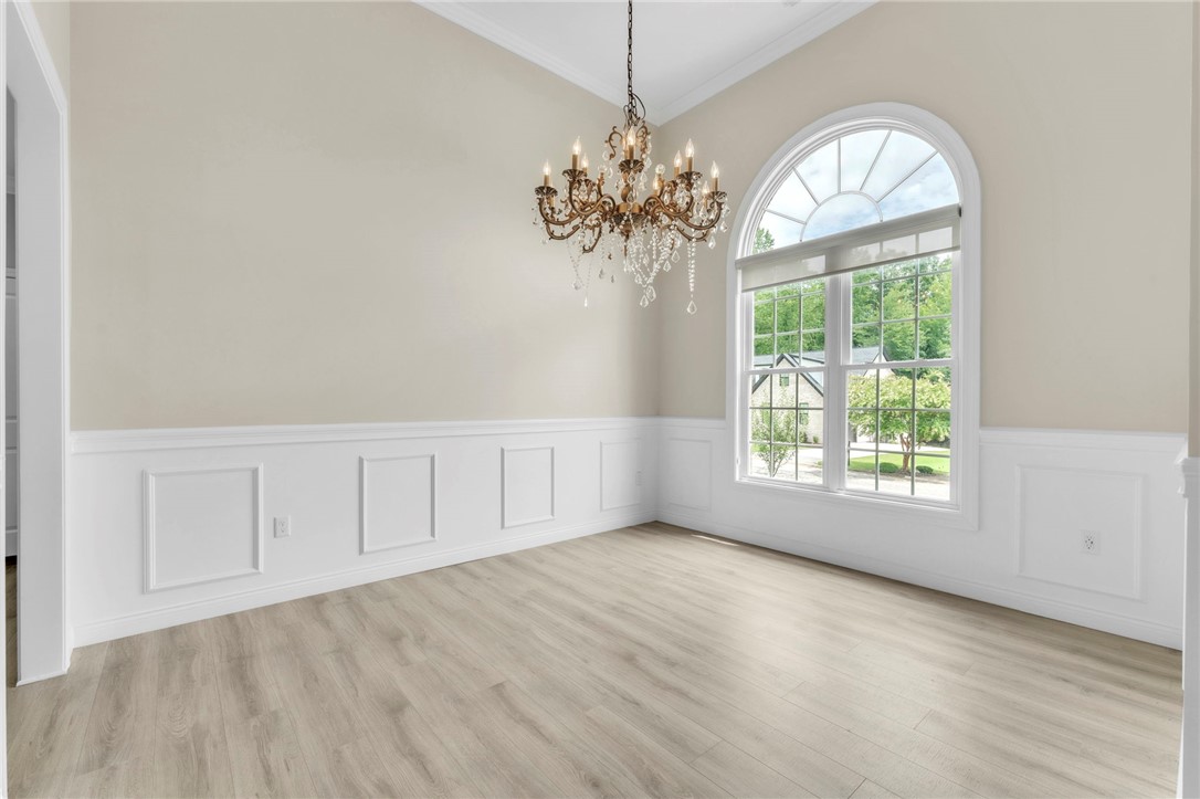 1015 Winmar Drive Anderson, SC 29621 - Photo 12 of 49 This bright space features tall ceilings and elegant wall paneling, perfect for memorable gatherings.