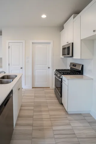 a view of a room with an empty space