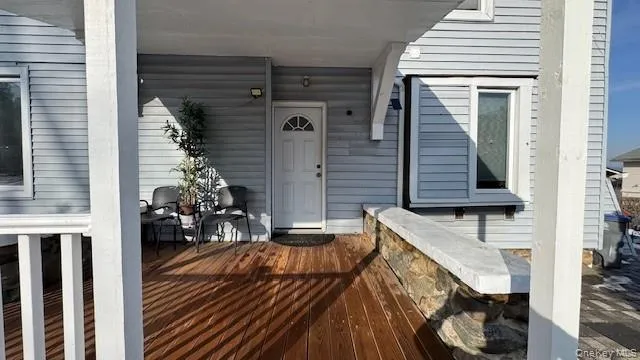 a balcony view with a outdoor seating space