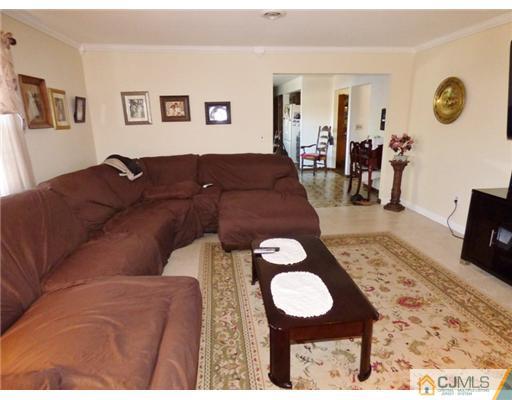 12 Sherwood Road Edison, NJ 08820 - Photo 12 of 23 a living room with furniture and wooden floor