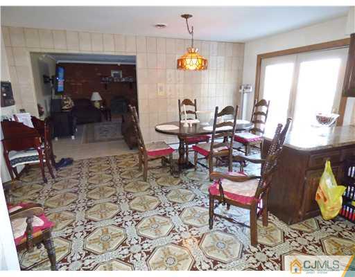 12 Sherwood Road Edison, NJ 08820 - Photo 13 of 23 a view of a dinning room with dining area