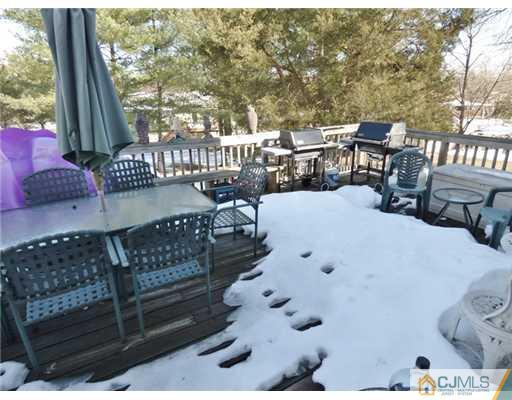 12 Sherwood Road Edison, NJ 08820 - Photo 8 of 23 a view of a patio with iron fence
