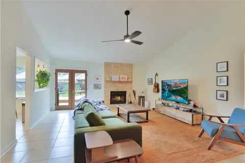 a living room with furniture and a rug