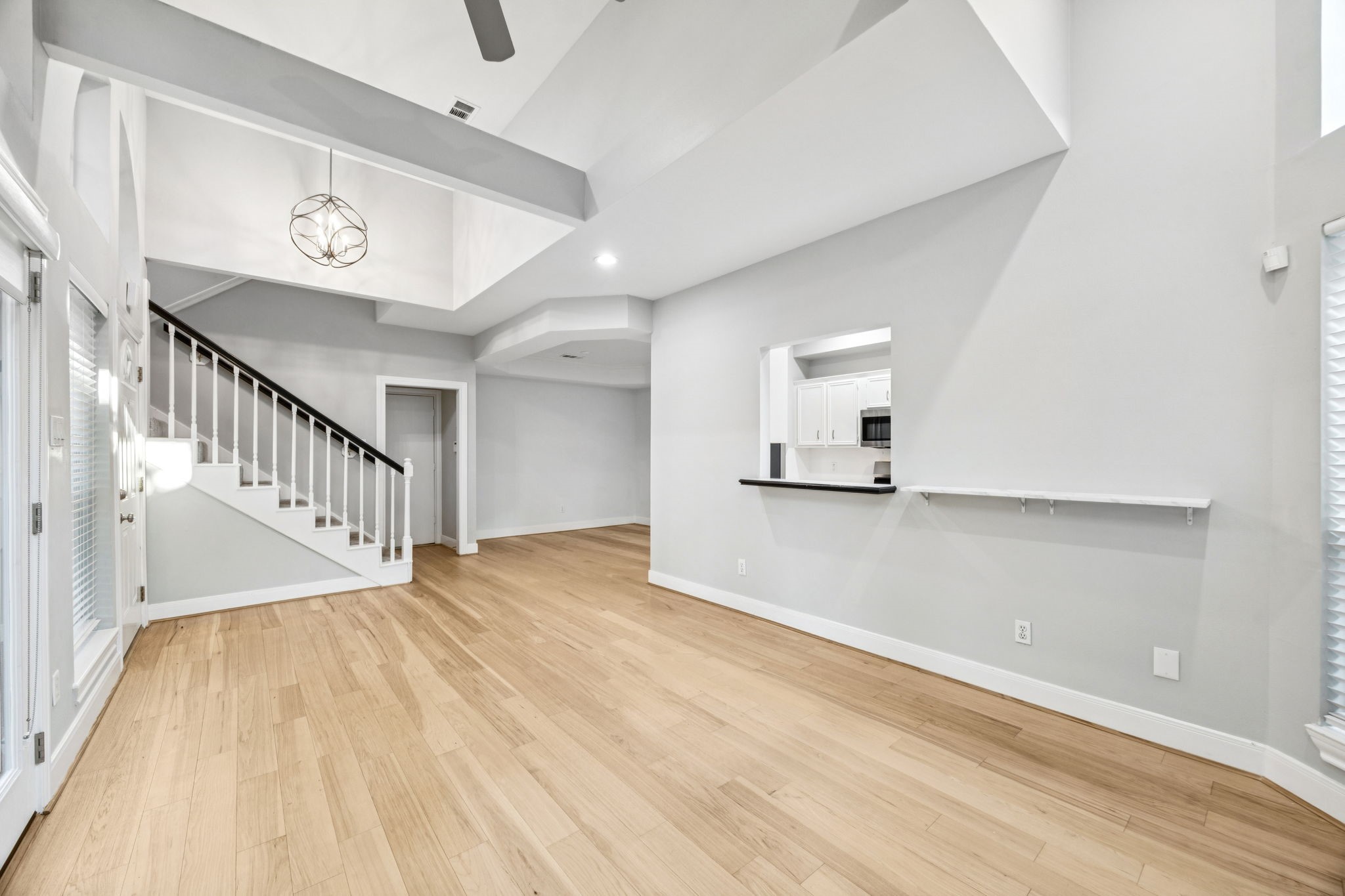 220 East 8th Street Houston, TX 77007 - Photo 9 of 35 a view of an empty room with wooden floor