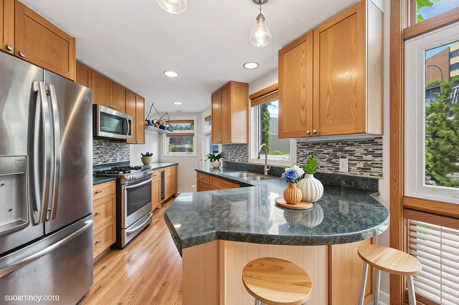 1889 Maple Avenue, Unit W10 Evanston, IL 60201 - Photo 3 of 22 a kitchen with stainless steel appliances granite countertop a sink a stove counter space and living room view