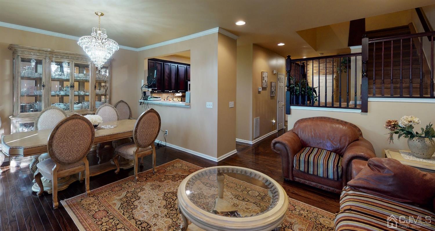 1069 Shadowlawn Drive, Unit 604 Green Brook, NJ 08812 - Photo 14 of 45 a living room with furniture a flat screen tv and rug