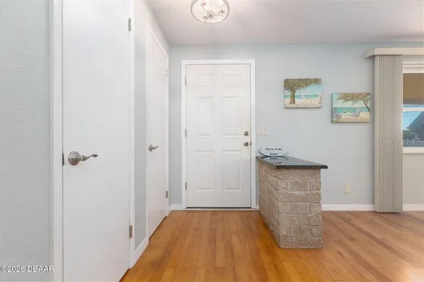 a view of livingroom with furniture and window