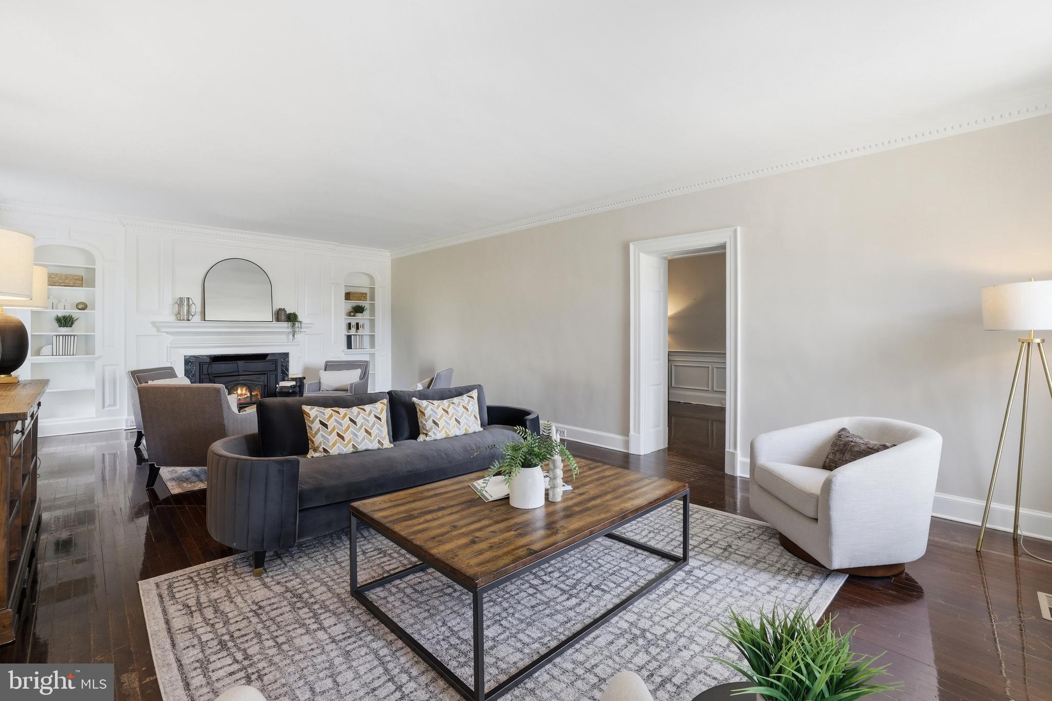 17781 Roxbury Hall Road Leesburg, VA 20175 - Photo 26 of 107 a living room with furniture and a rug
