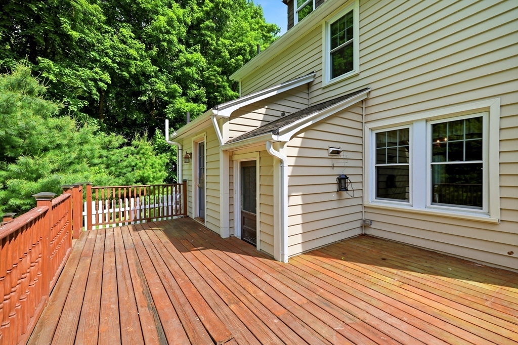 32 Lincoln Road Longmeadow, MA 01106 - Photo 32 of 36 a view of a wooden deck with a yard