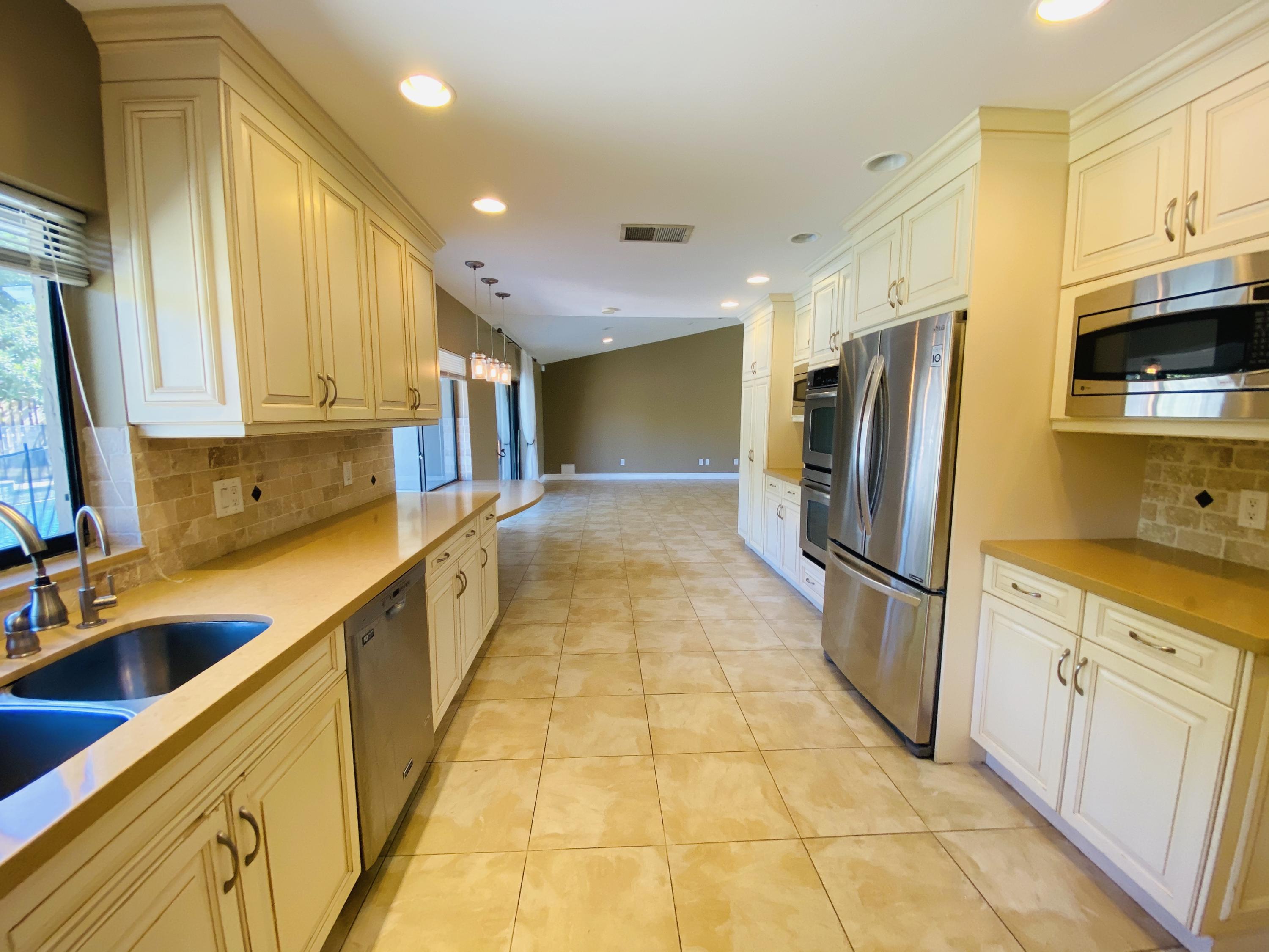 4449 Brandywine Drive Boca Raton, FL 33487 - Photo 9 of 27 1FC70B3D-4341-4F11-89B1-D995BC1967AE