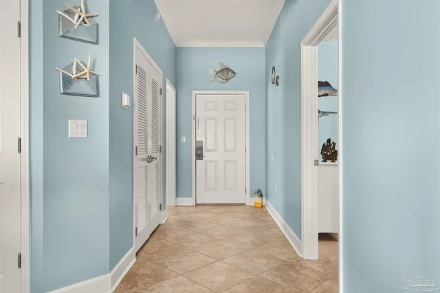 a bedroom with a bed a large window and flat screen tv