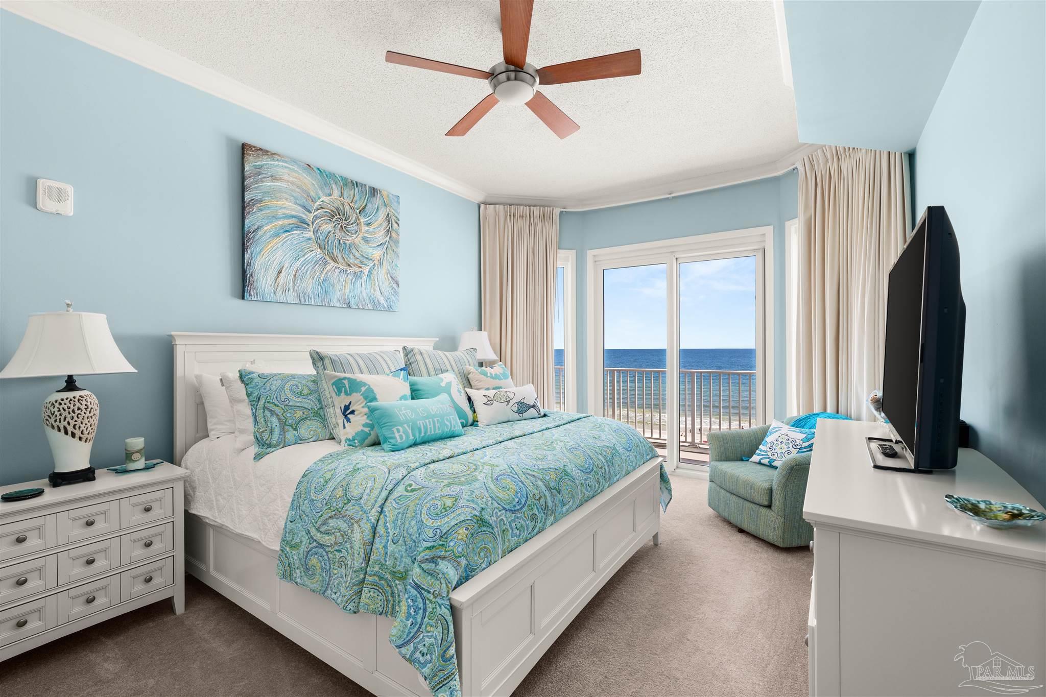 14511 Perdido Key Drive, Unit 508 Perdido Key, FL 32507 - Photo 19 of 59 a bedroom with a bed a large window and flat screen tv