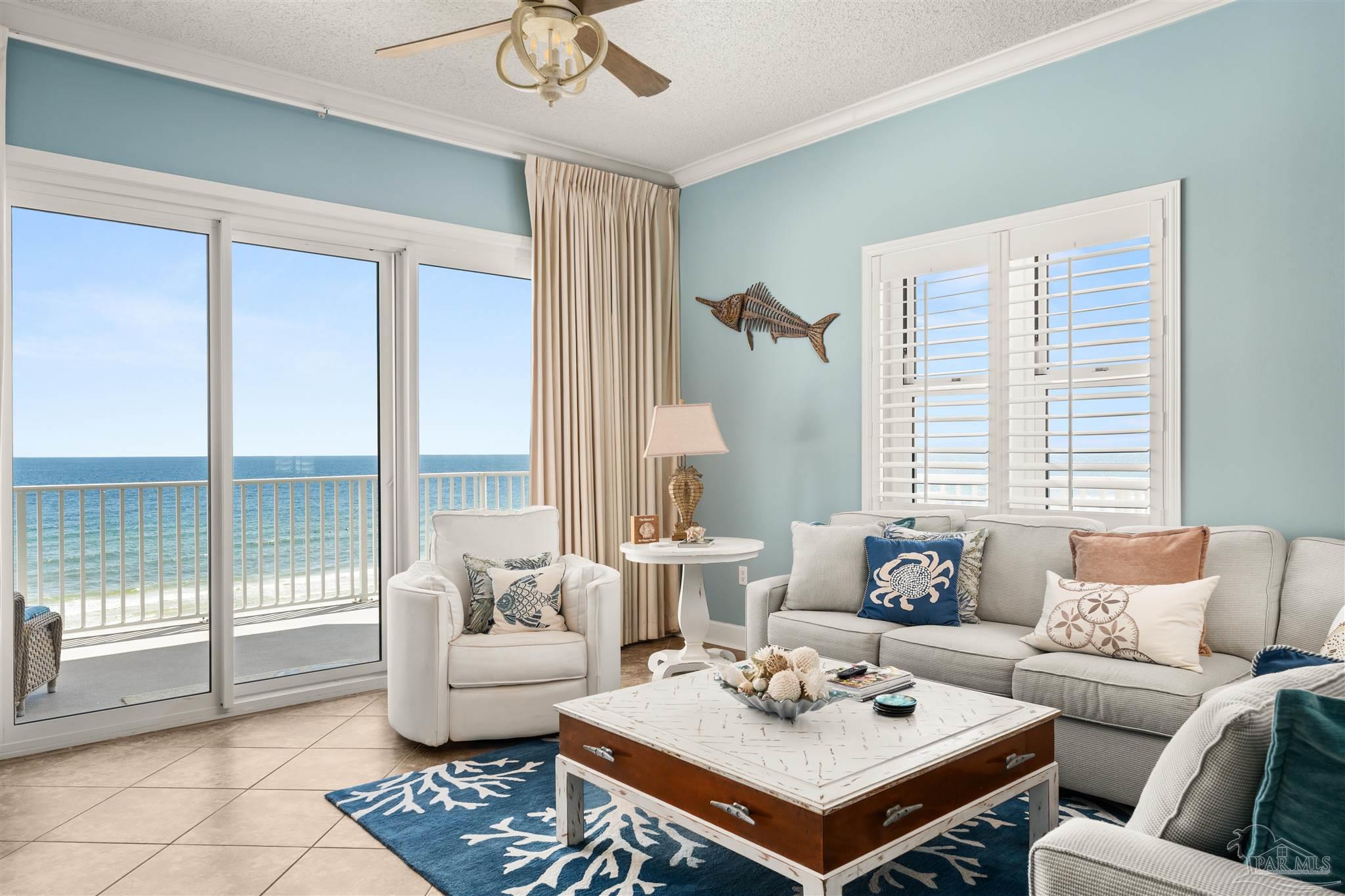 14511 Perdido Key Drive, Unit 508 Perdido Key, FL 32507 - Photo 2 of 59 a living room with furniture and a large window with garden view
