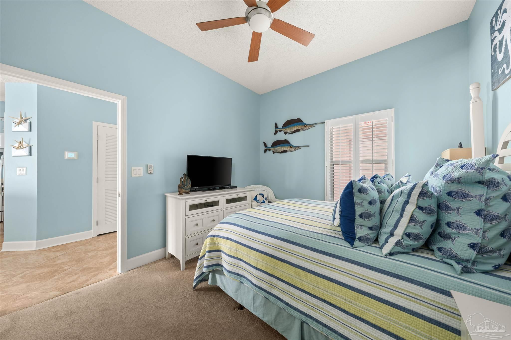 14511 Perdido Key Drive, Unit 508 Perdido Key, FL 32507 - Photo 25 of 59 a bedroom with a bed and a television