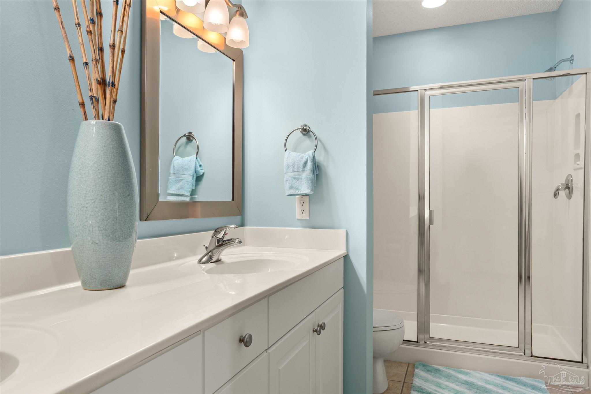 14511 Perdido Key Drive, Unit 508 Perdido Key, FL 32507 - Photo 28 of 59 a bathroom with a sink and a mirror