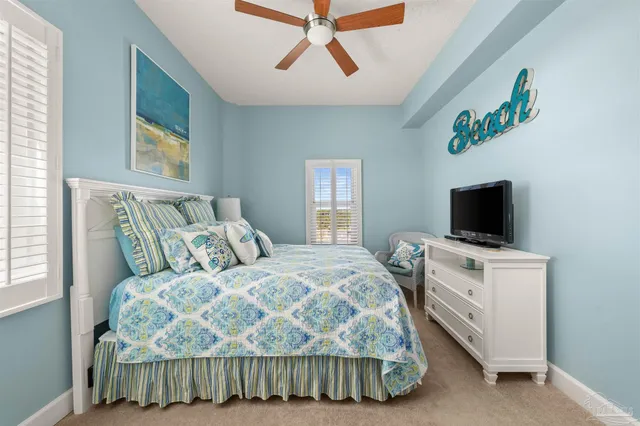 a balcony with furniture and wooden floor