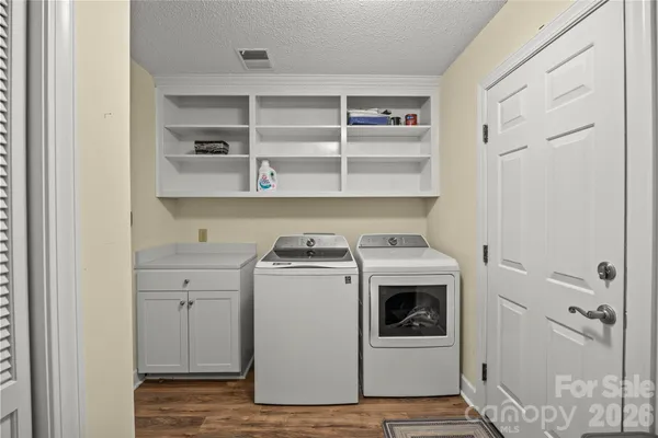 a view of a room that has a window in it