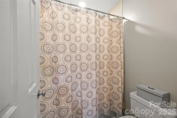 a living room with furniture and window