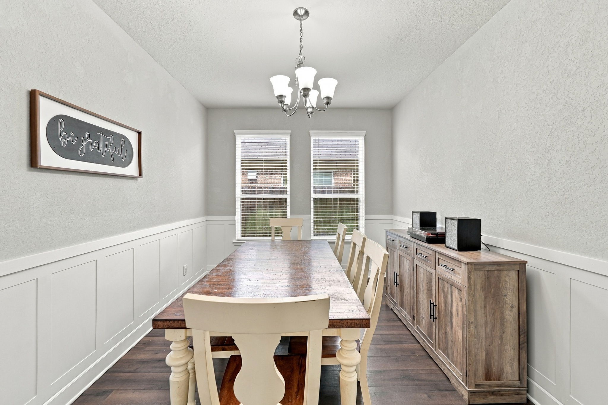 3406 Coopers Ridge Way Houston, TX 77084 - Photo 5 of 22 Formal Dining: Dedicated dining room features decorative wall detailing, twin windows and ample space for a full-size dining table.