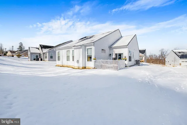 a view of a house with a big yard