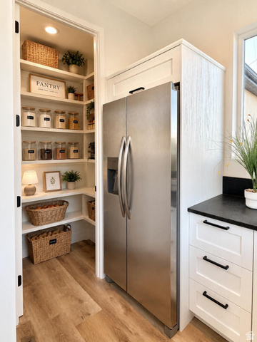 905 Settlement Canyon Road Tooele, UT 84074 - Photo 6 of 12 Walk-in pantry featuring white built-in shelving and recessed lighting