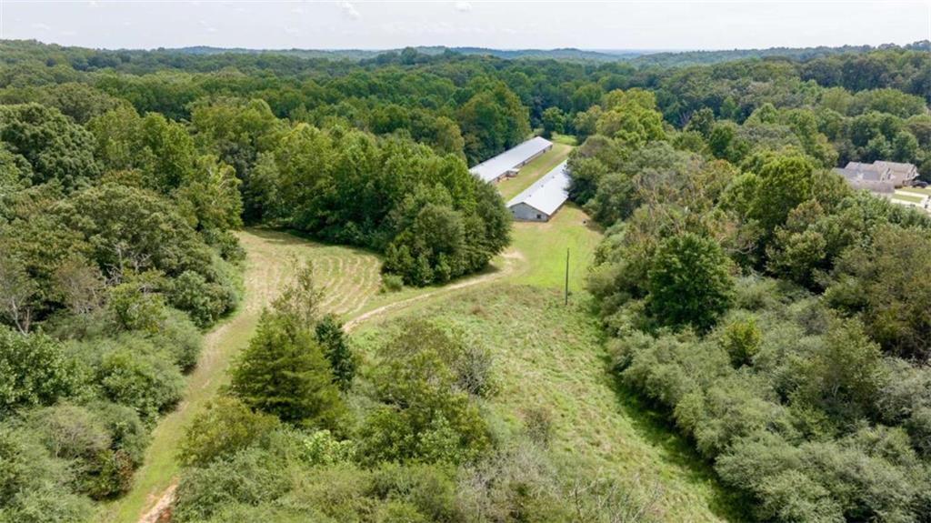 0 Caudell Drive Lula, GA 30554 - Photo 13 of 38 a view of a house with a forest