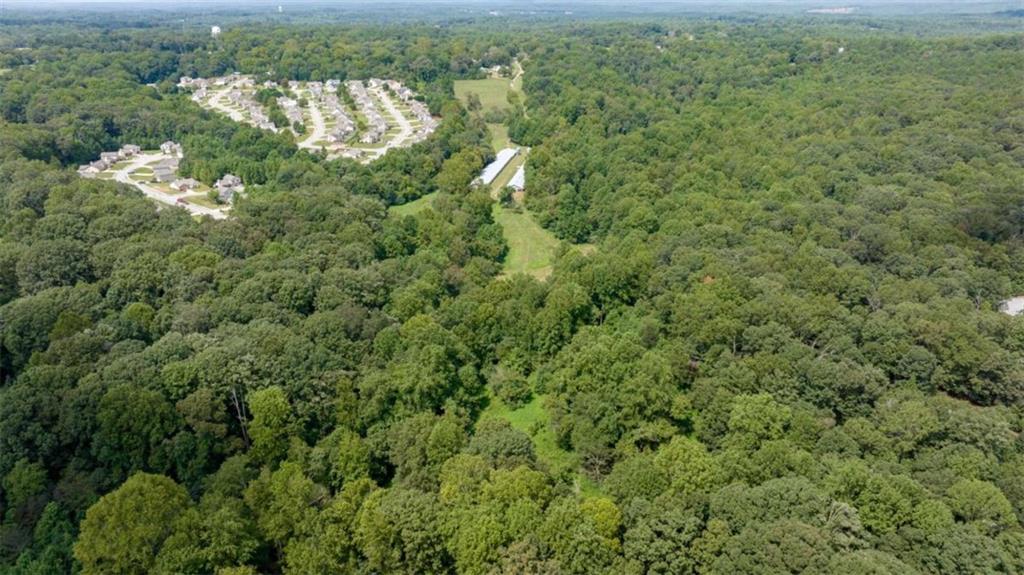 0 Caudell Drive Lula, GA 30554 - Photo 17 of 38 an aerial view of residential houses with outdoor space and trees