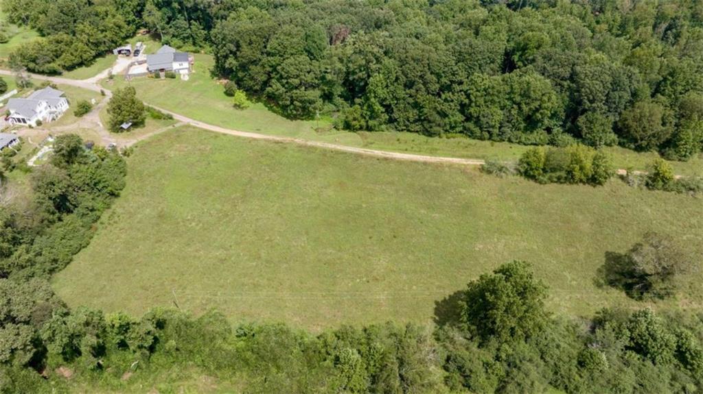 0 Caudell Drive Lula, GA 30554 - Photo 21 of 38 an aerial view of a residential houses with outdoor space and trees all around