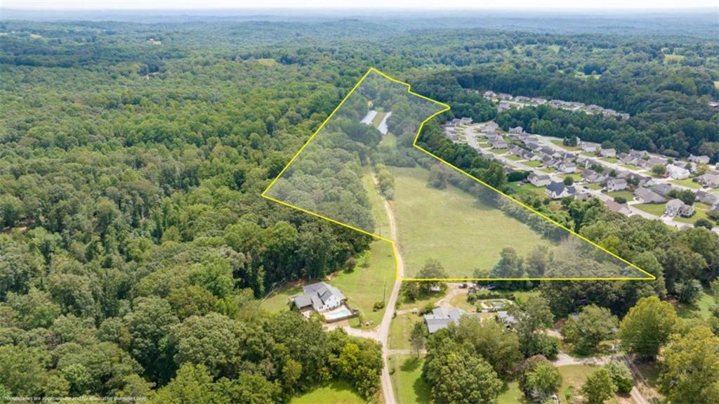 0 Caudell Drive Lula, GA 30554 - Photo 6 of 38 an aerial view of residential houses with outdoor space and trees