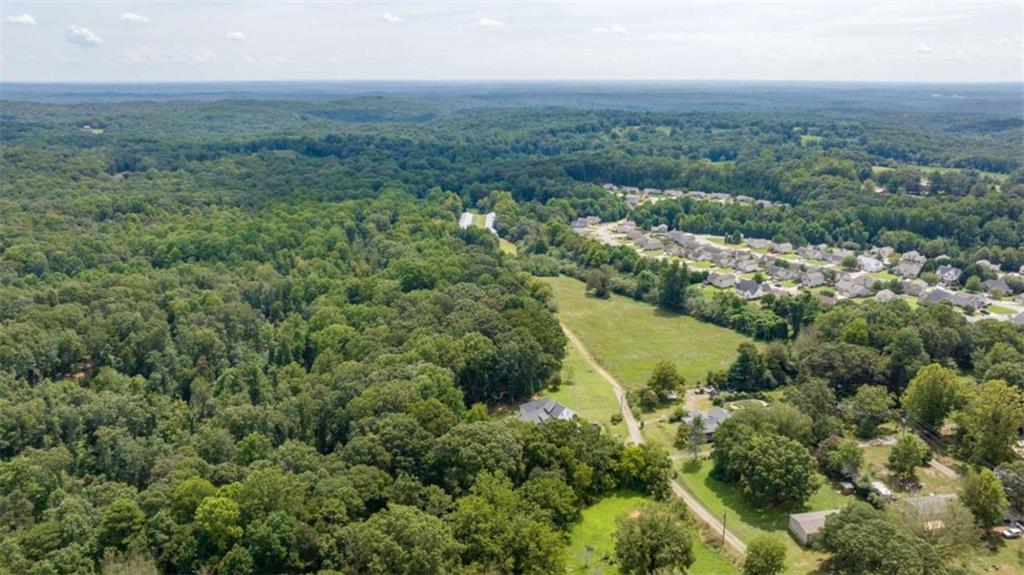 0 Caudell Drive Lula, GA 30554 - Photo 8 of 38 an aerial view of residential house with outdoor space and trees all around