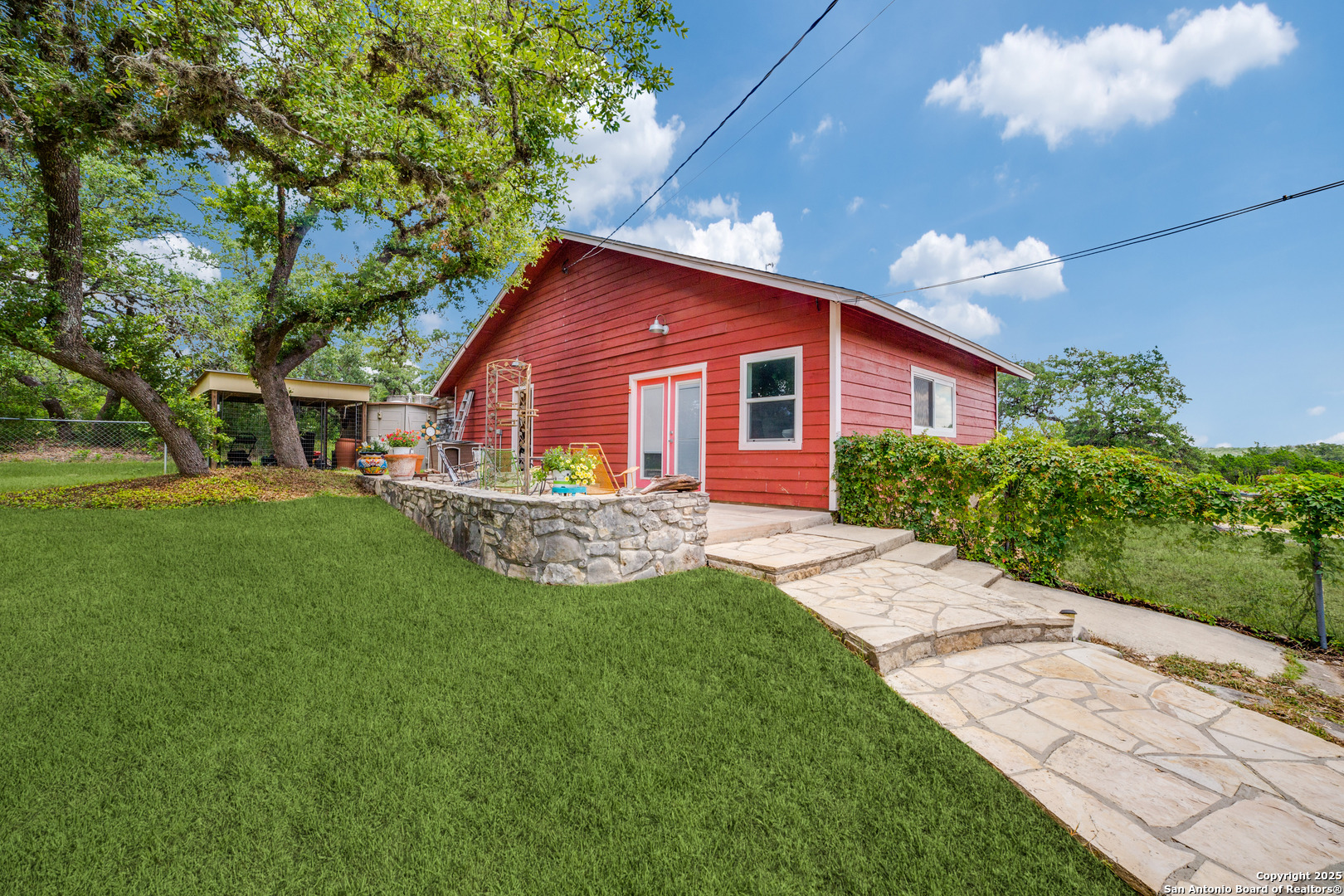 20892 Bluehill Pass Helotes, TX 78023 - Photo 17 of 36 a view of a house with a yard