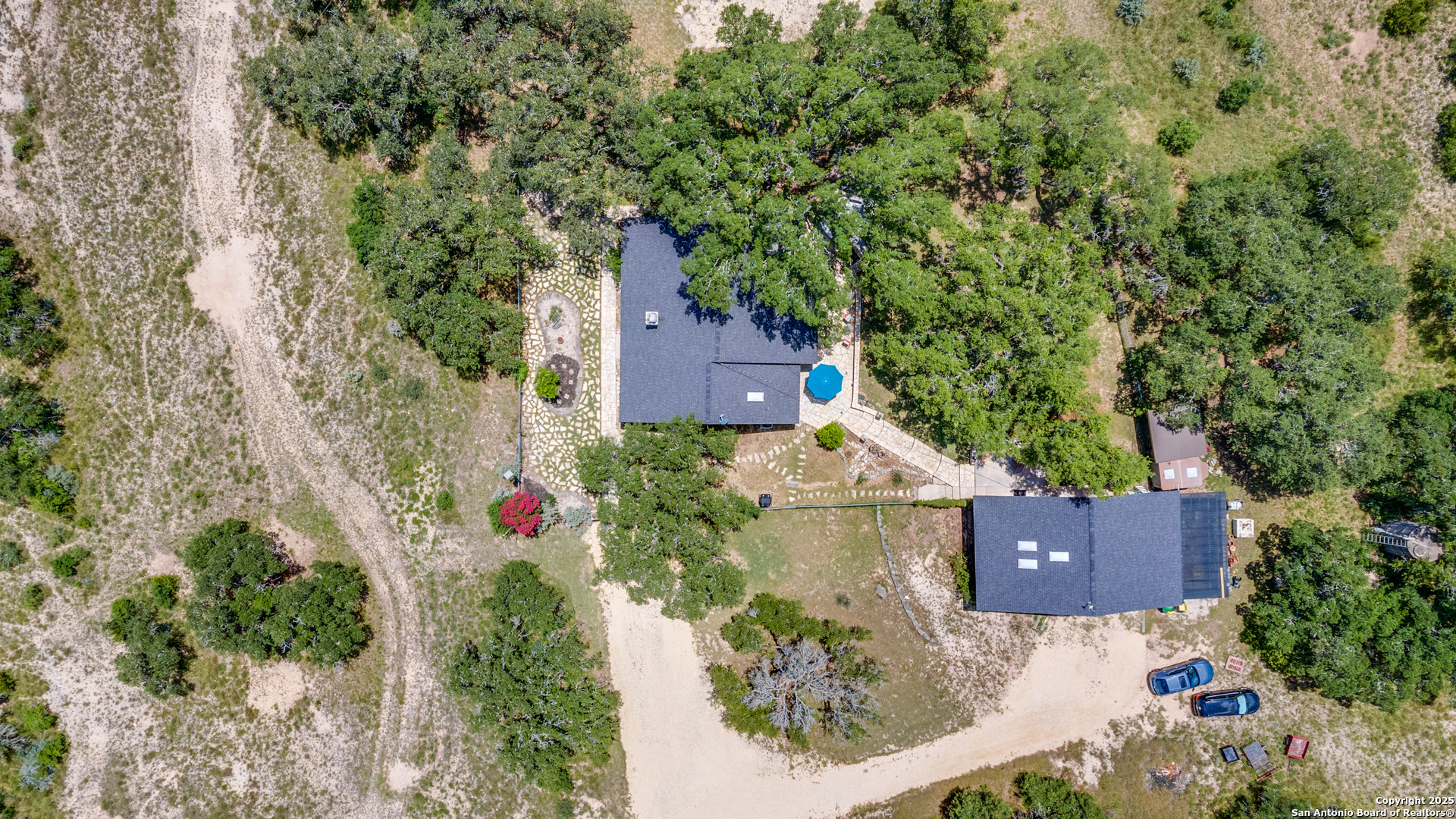 20892 Bluehill Pass Helotes, TX 78023 - Photo 24 of 36 an aerial view of a house with yard