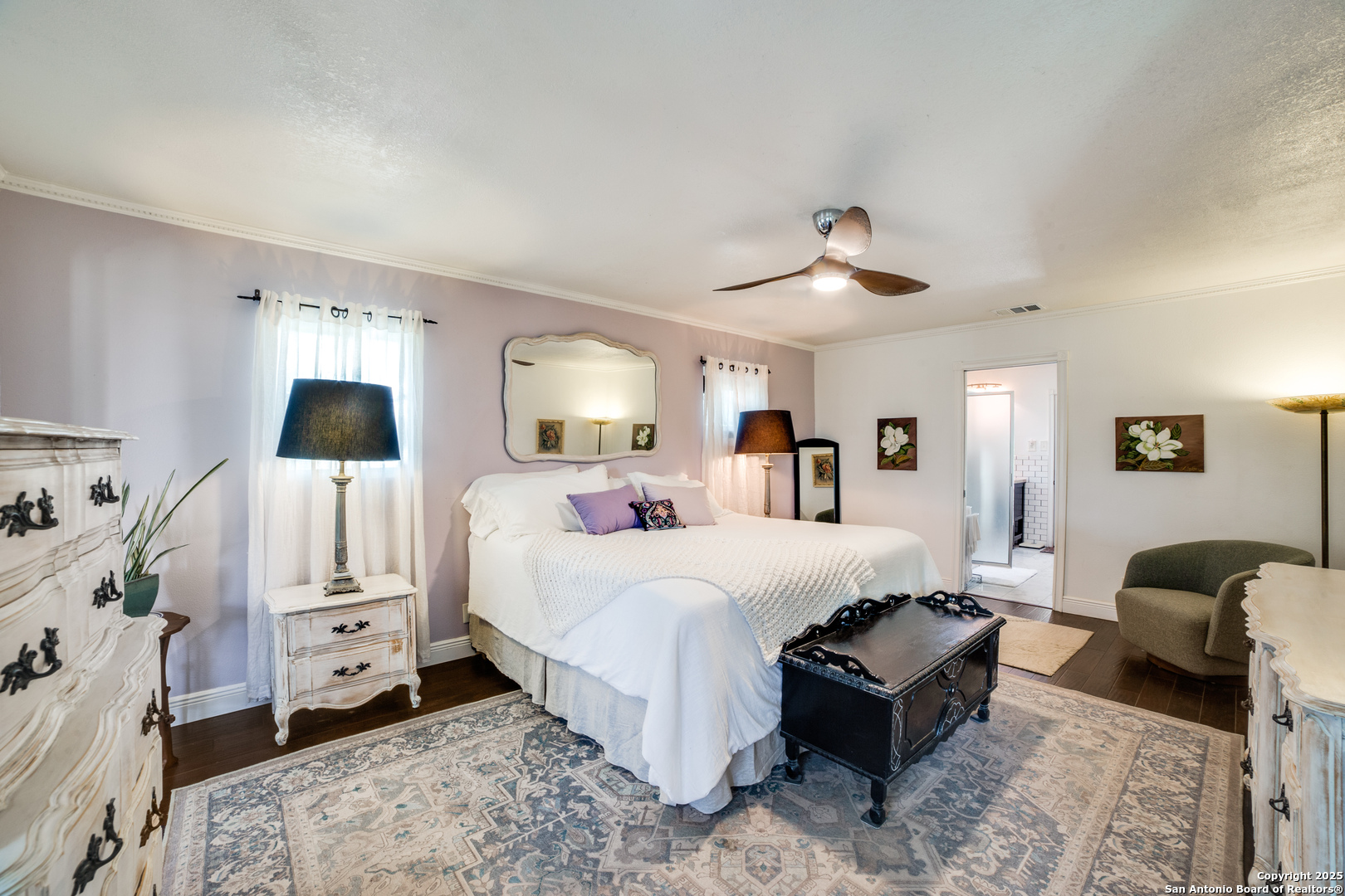 20892 Bluehill Pass Helotes, TX 78023 - Photo 7 of 36 a bedroom with a bed and wooden floor