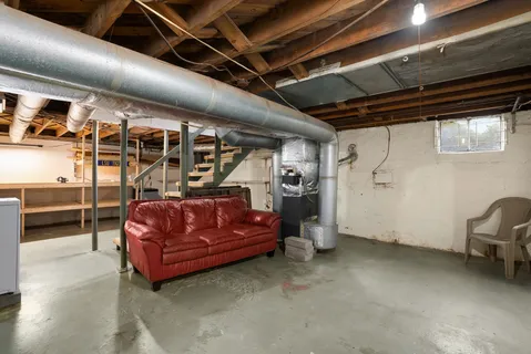 a view of an empty room with racks on the wall