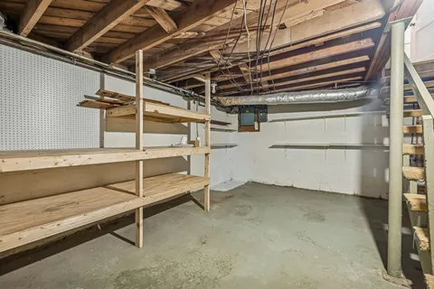 a view of a patio with table and chairs and potted plants