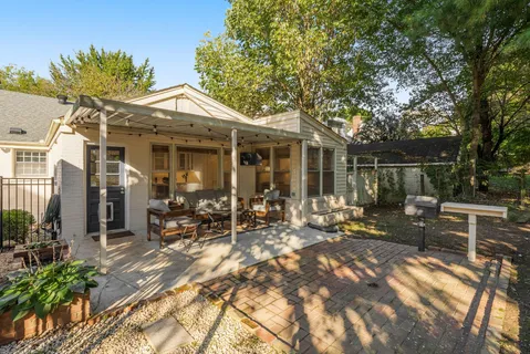 a view of a yard with trees