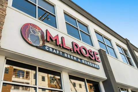 a view of a street with benches