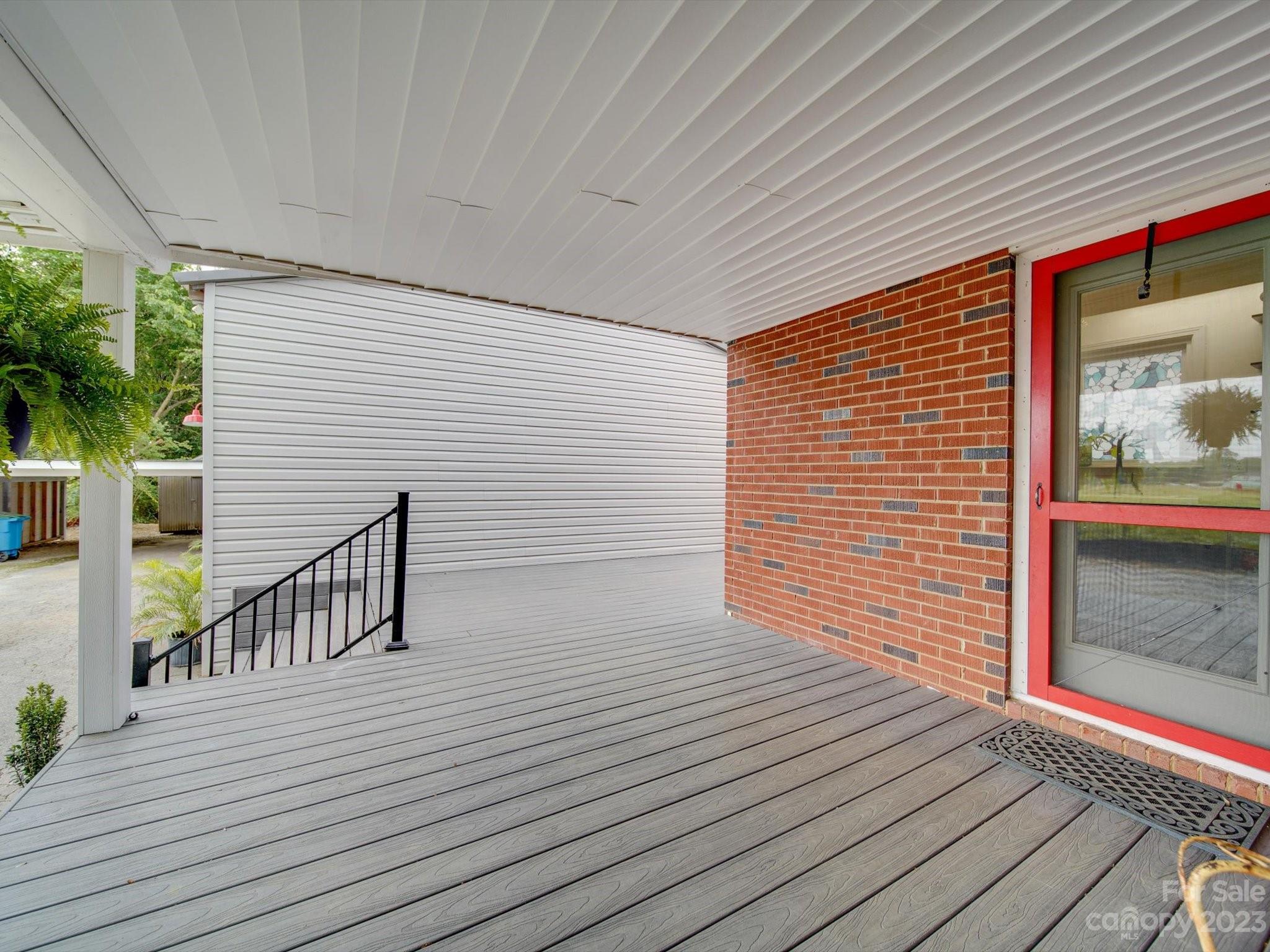 4197 Stallings Road Harrisburg, NC 28075 - Photo 25 of 41 a view of a patio with wooden floor
