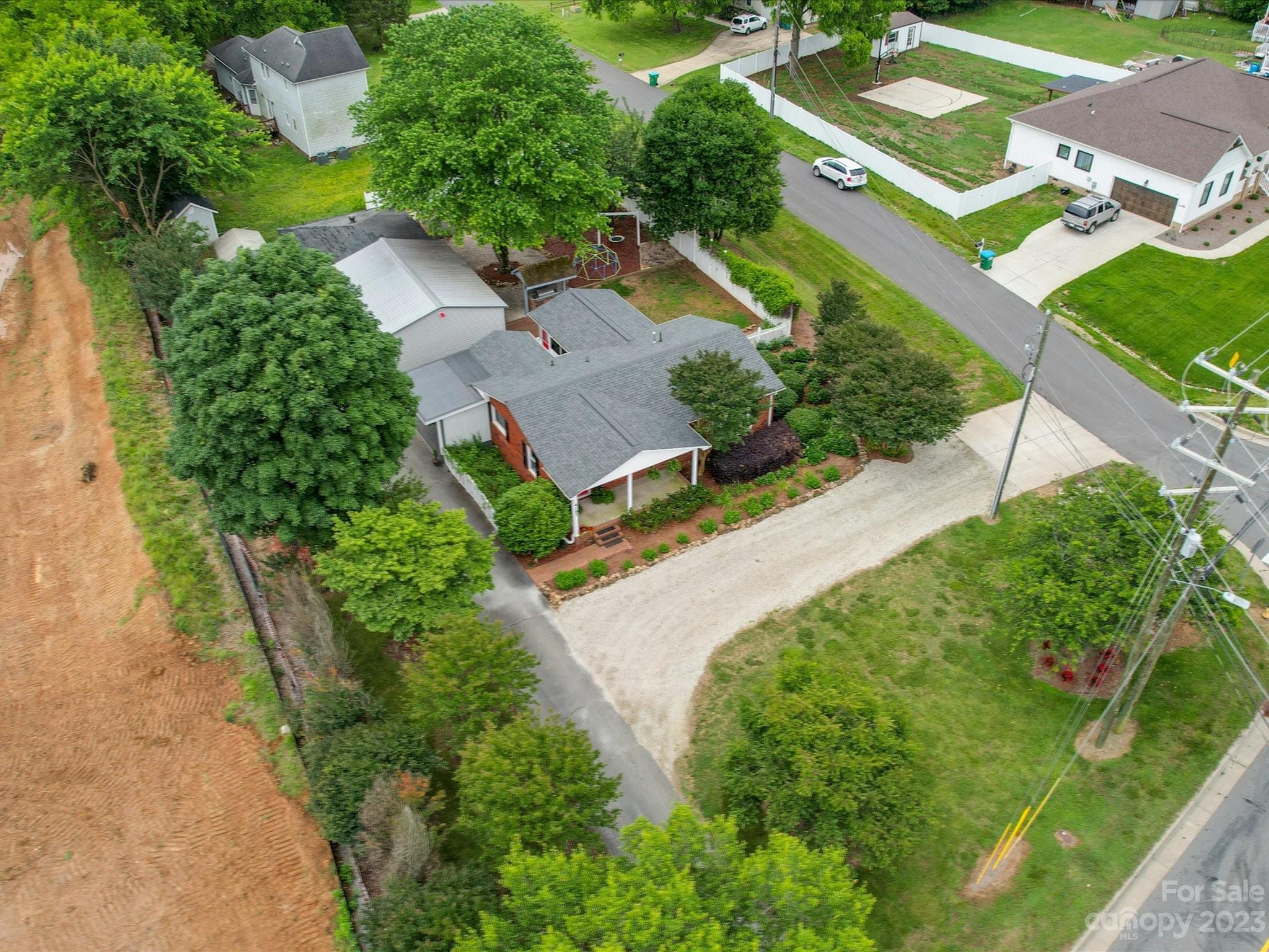 4197 Stallings Road Harrisburg, NC 28075 - Photo 41 of 41 an aerial view of a house with a garden