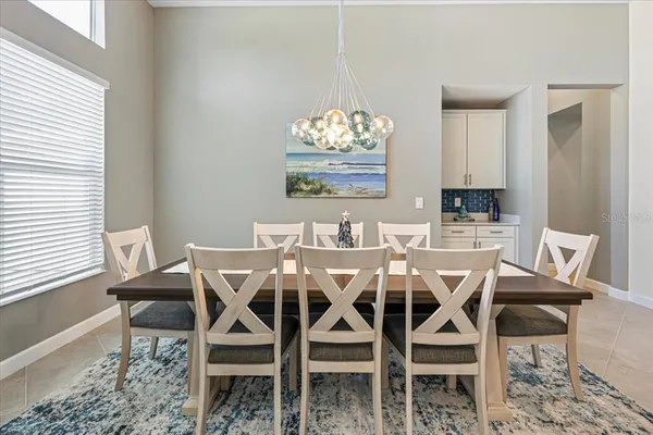 a view of a dining room with furniture