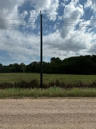 a view of a lake with a big yard