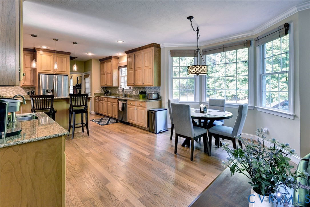 4015 Cold Spring Road Williamsburg, VA 23188 - Photo 13 of 57 Kitchen featuring wood-finish flooring, light wood