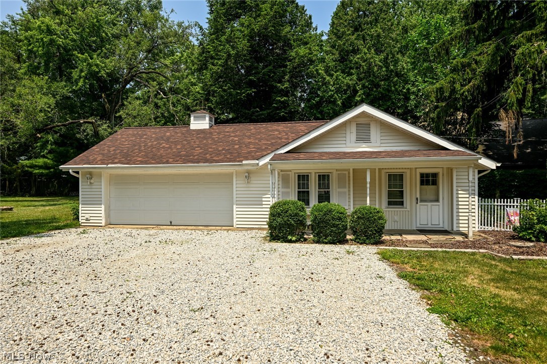 24481 Barrett Road Olmsted Falls, OH 44138 - Photo 35 of 49 View of front of property with a garage and covered porch