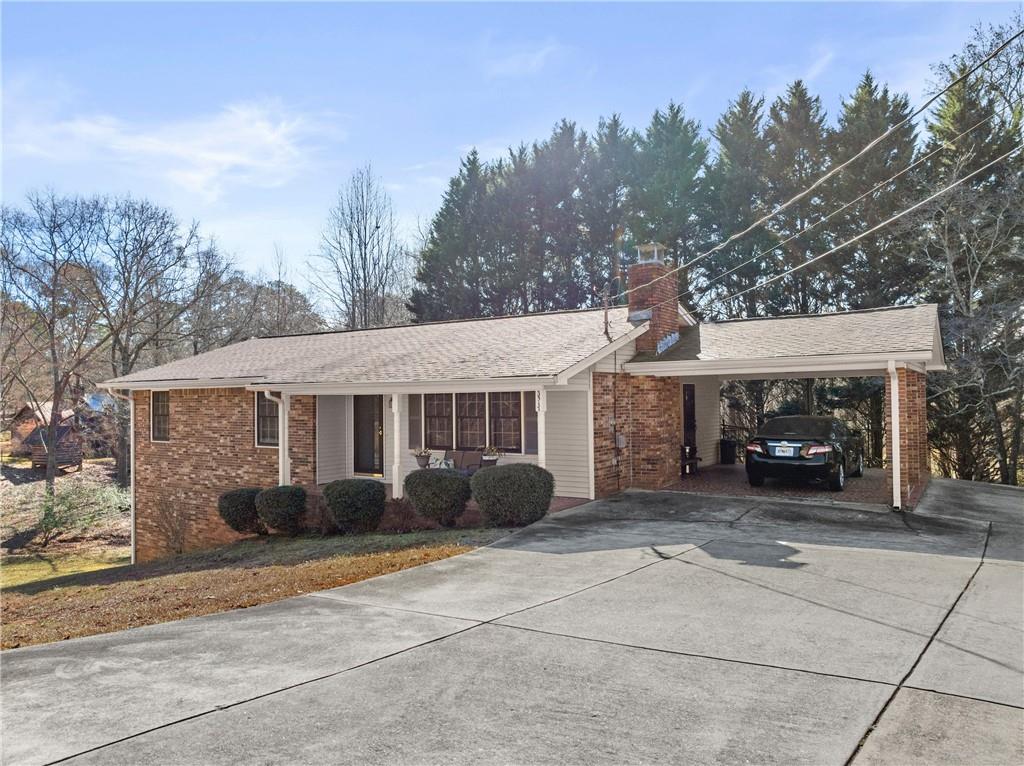 3517 Stancil Road Gainesville, GA 30506 - Photo 1 of 1 a view of a house with a garden and pathway